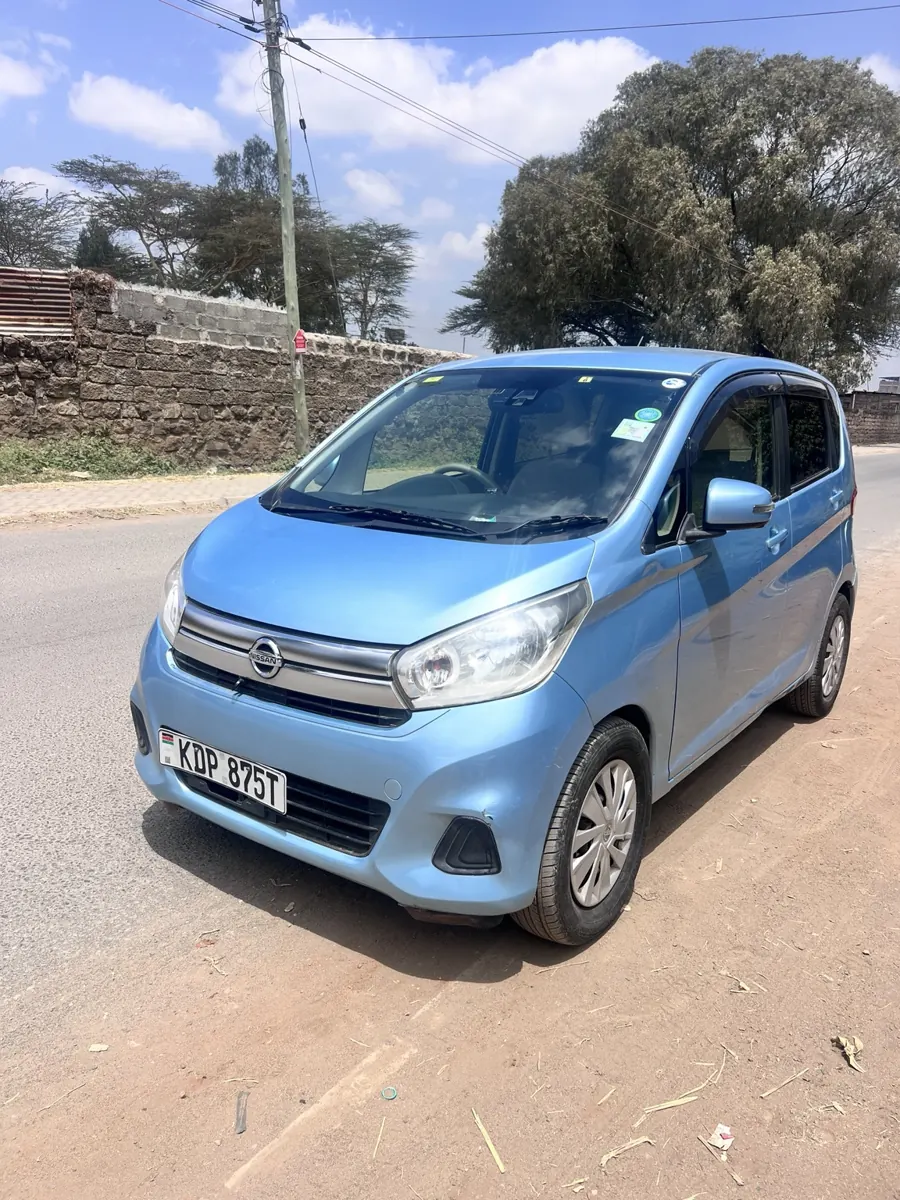 Light blue Nissan Dayz: front three-quarter view