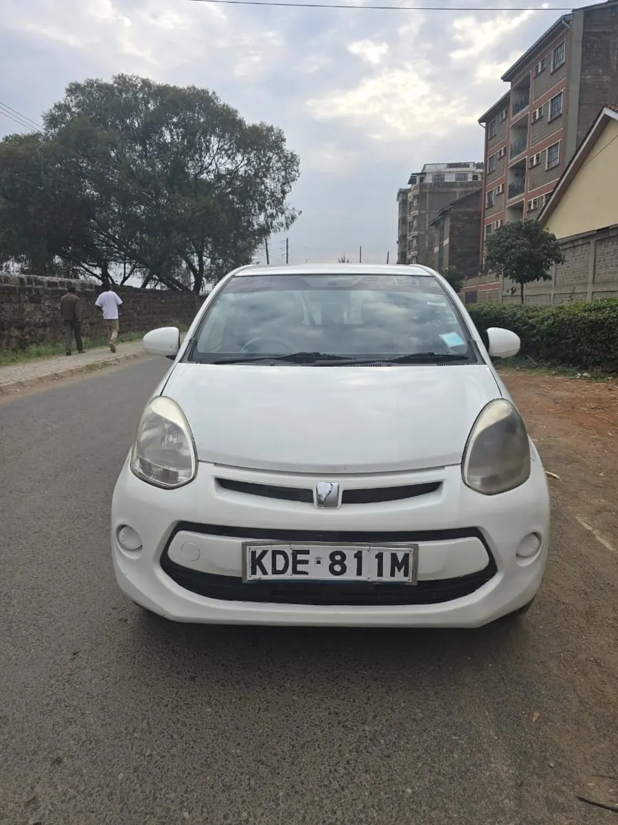 2015 white Toyota Passo KDE 811M — front view