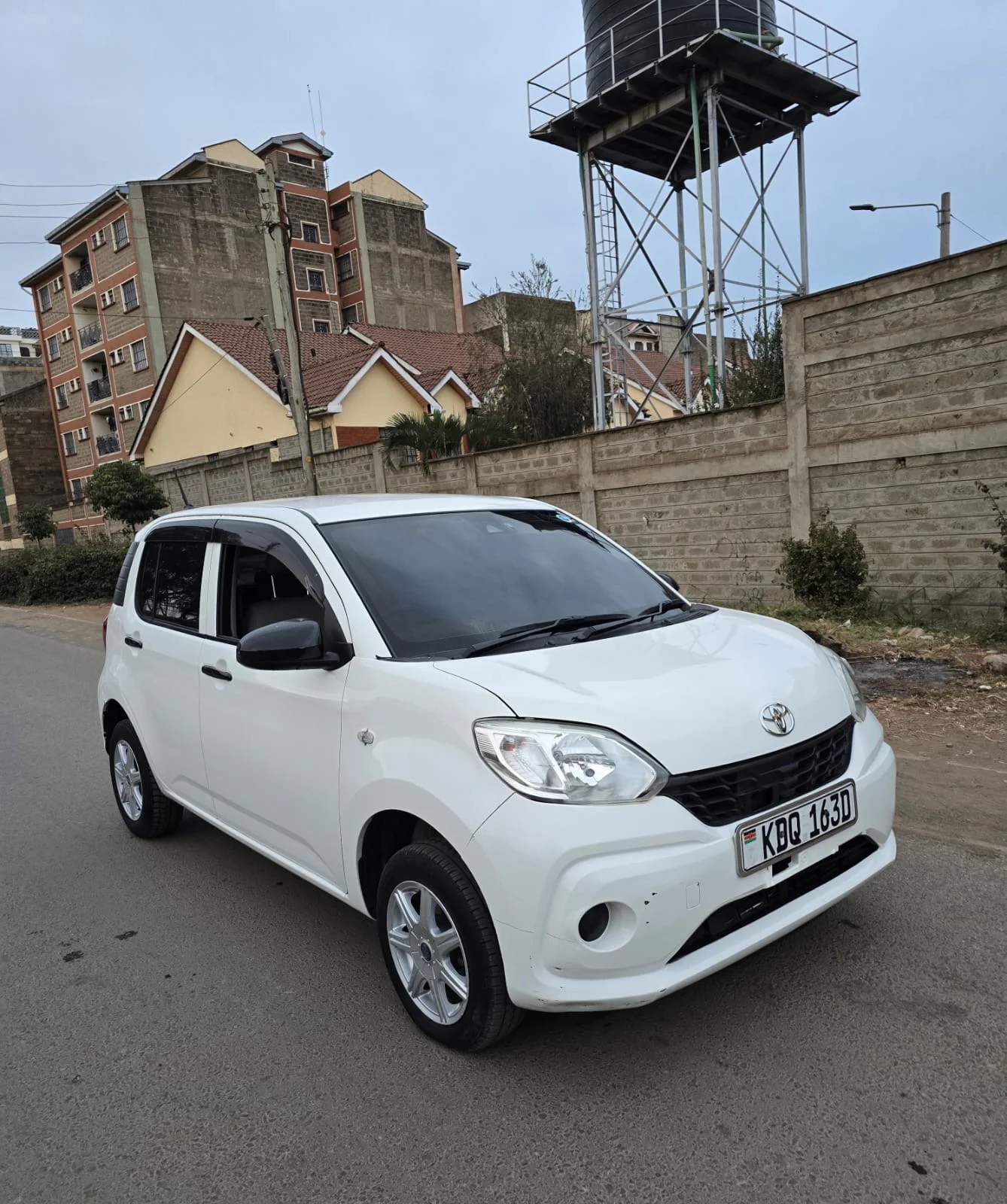 2017 white Toyota Passo KDQ 163D — front three-quarter view