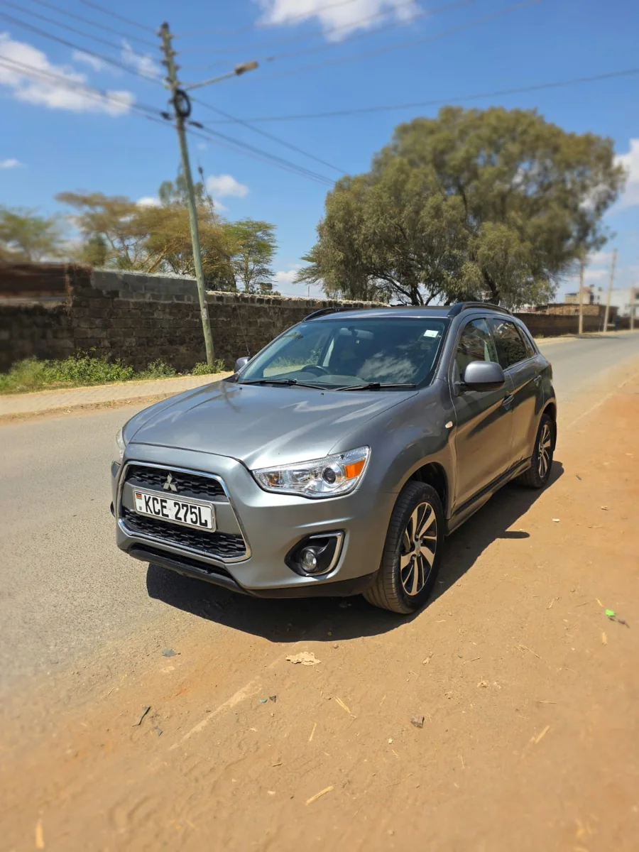 Grey 2015 Mitsubishi RVR KCE 275L: front three-quarter view